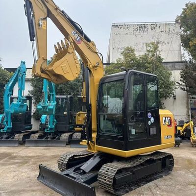 Excavateur Caterpillar d'occasion 5,6 km/h Vitesse et maniabilité pour les chantiers de reconstruction urbaine occupés