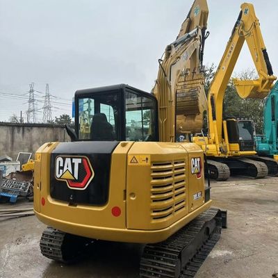 Excavateur Caterpillar d'occasion 5,6 km/h Vitesse et maniabilité pour les chantiers de reconstruction urbaine occupés
